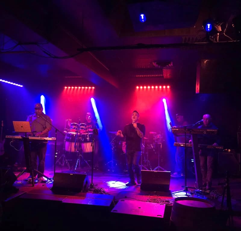 Full band under the blue lights